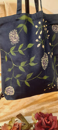 Lilac on blue canvas tote bag