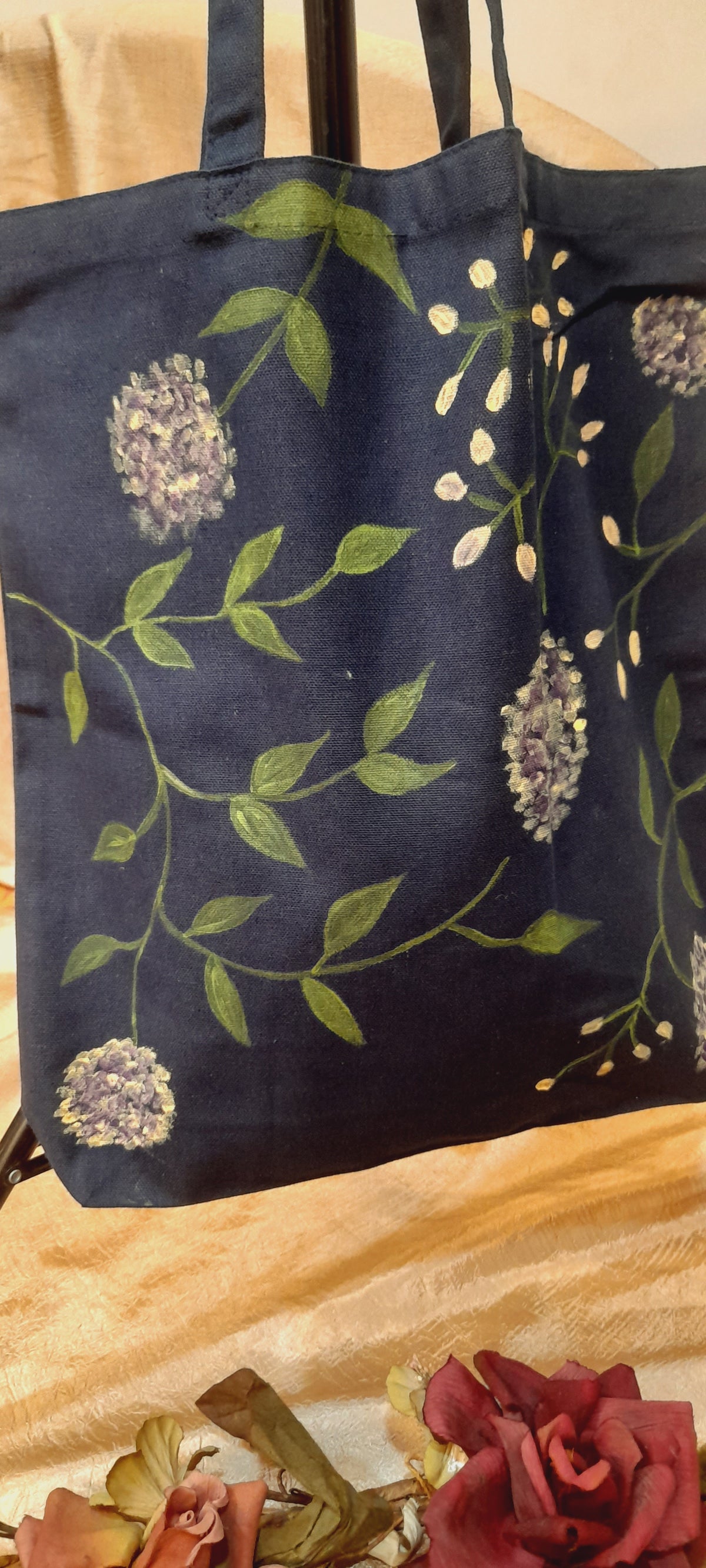 Lilac on blue canvas tote bag