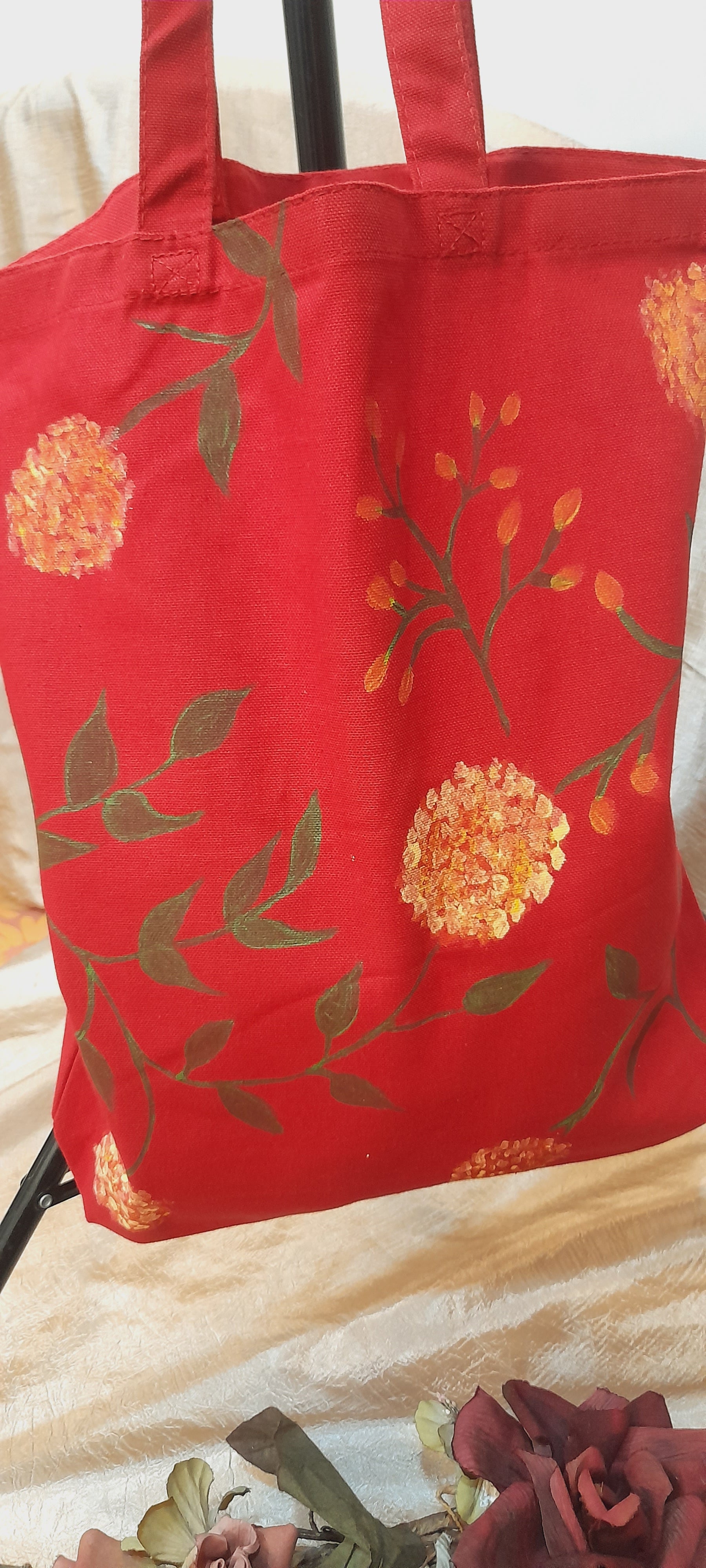 Yellow on red canvas tote bag