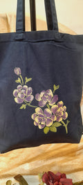 Purple on navy blue canvas tote bag