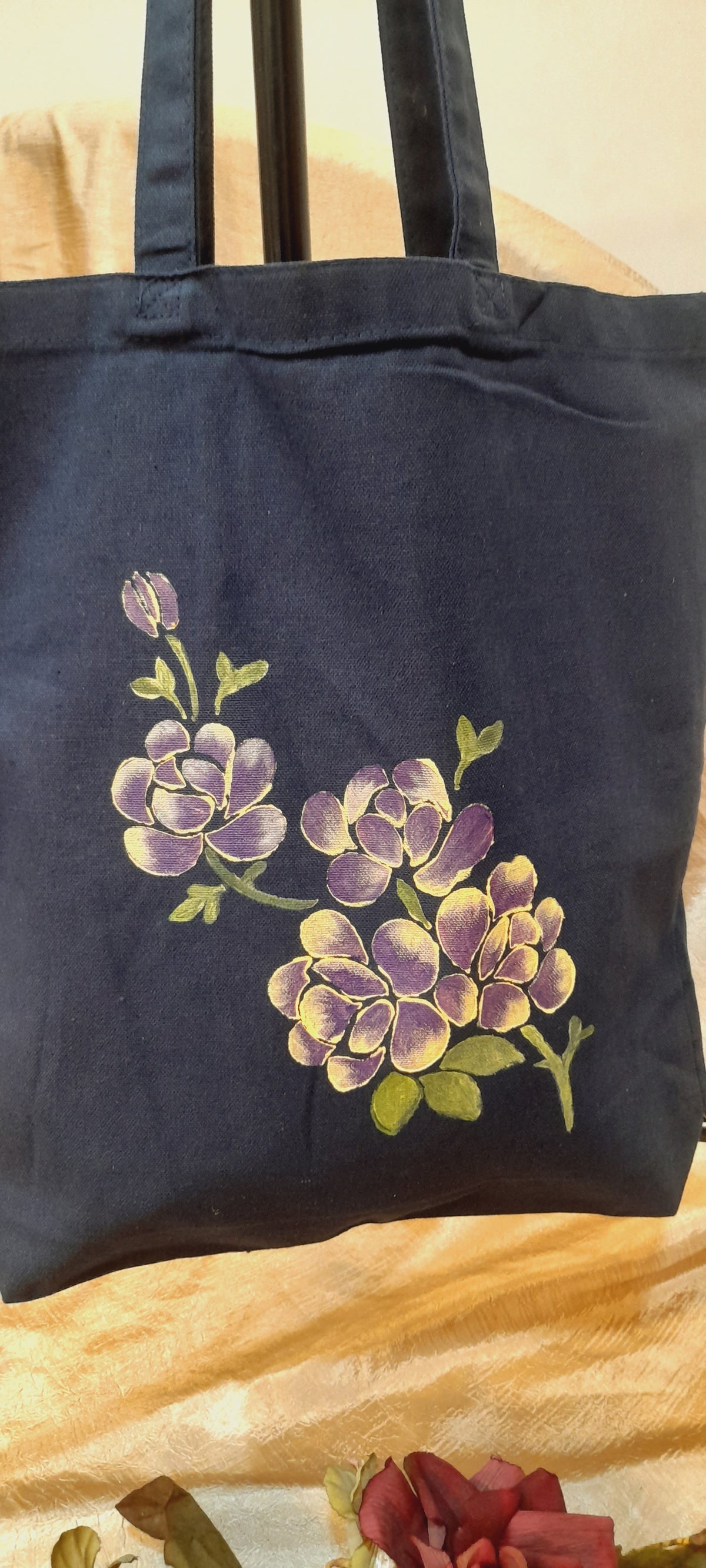 Purple on navy blue canvas tote bag
