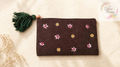 Hand-embellished cotton pouch D11